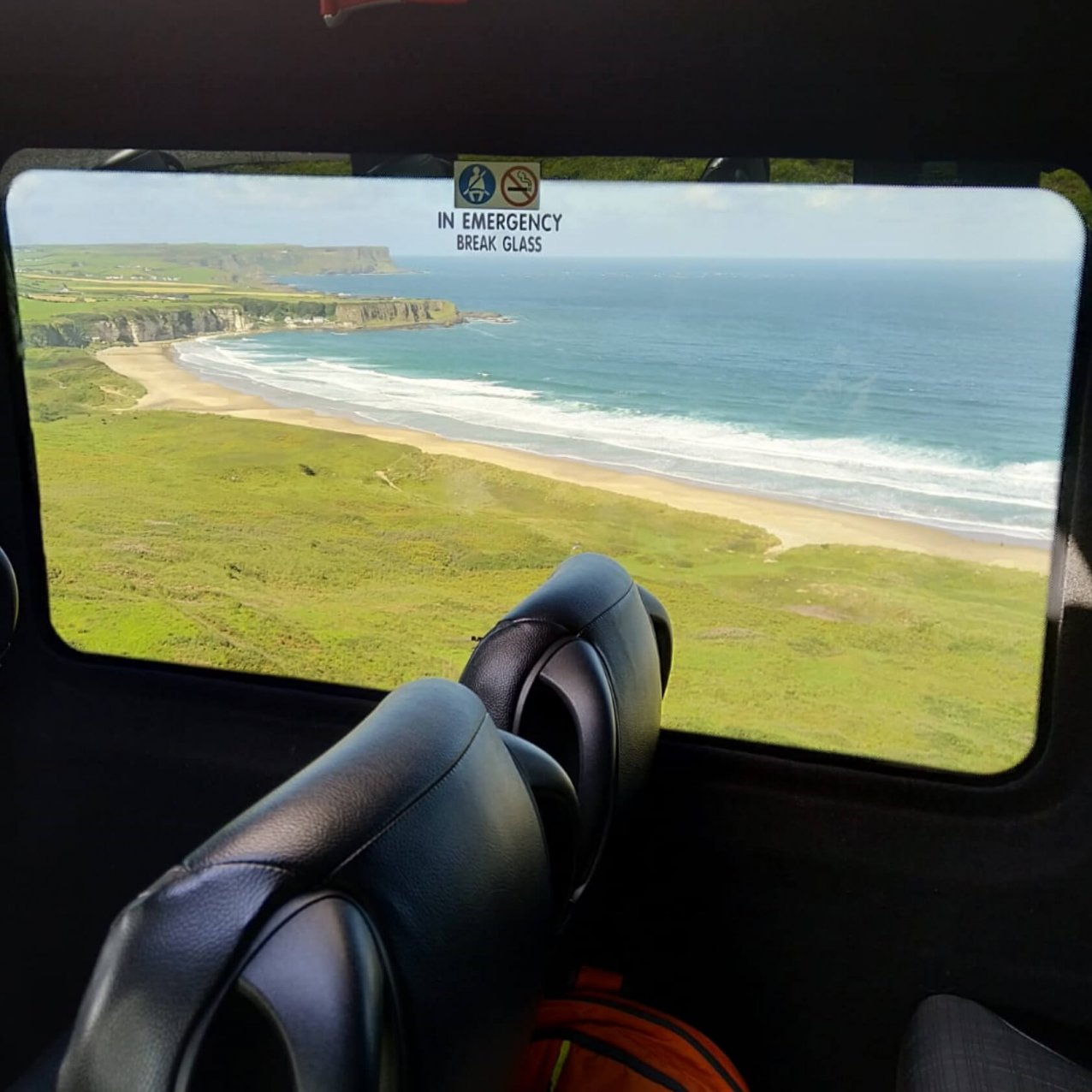 Interior view of a scenic beach in Ireland from a Driftwood tours Drifter tour vehicle