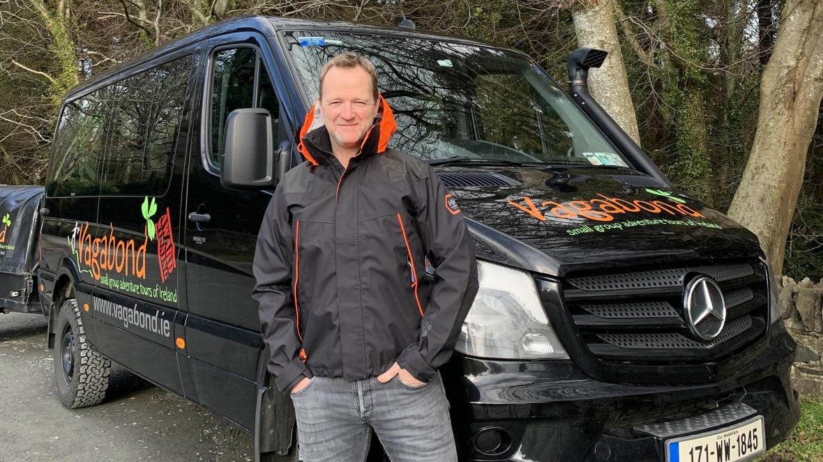 Rob Rankin, Managing Director of Vagabond Tours of Ireland with a tour vehicle