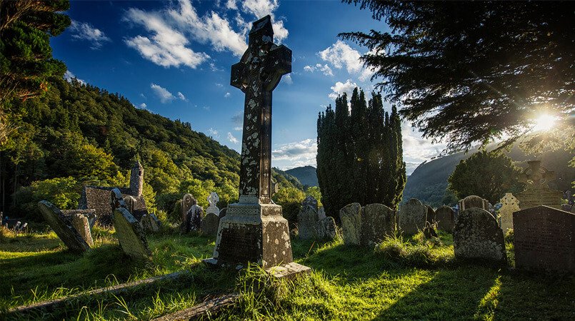 Graveyard and cross in Glendalough, Ireland